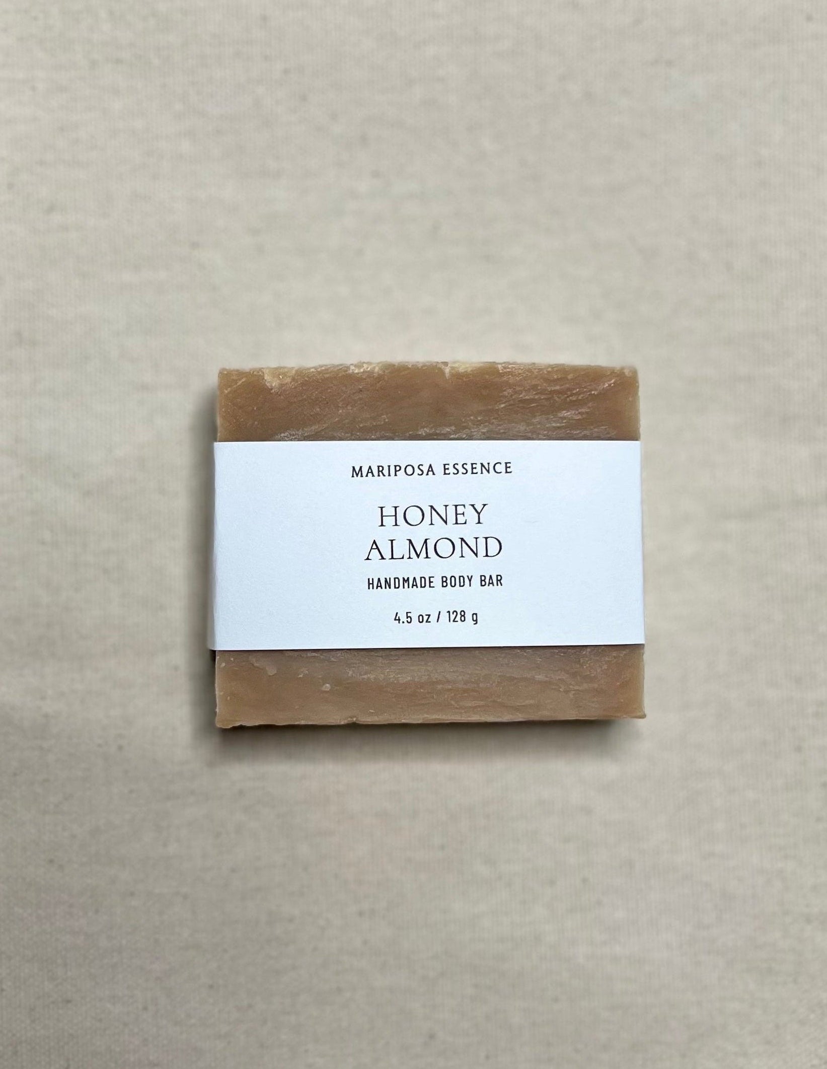 Honey Almond soap with cotton fabric display.