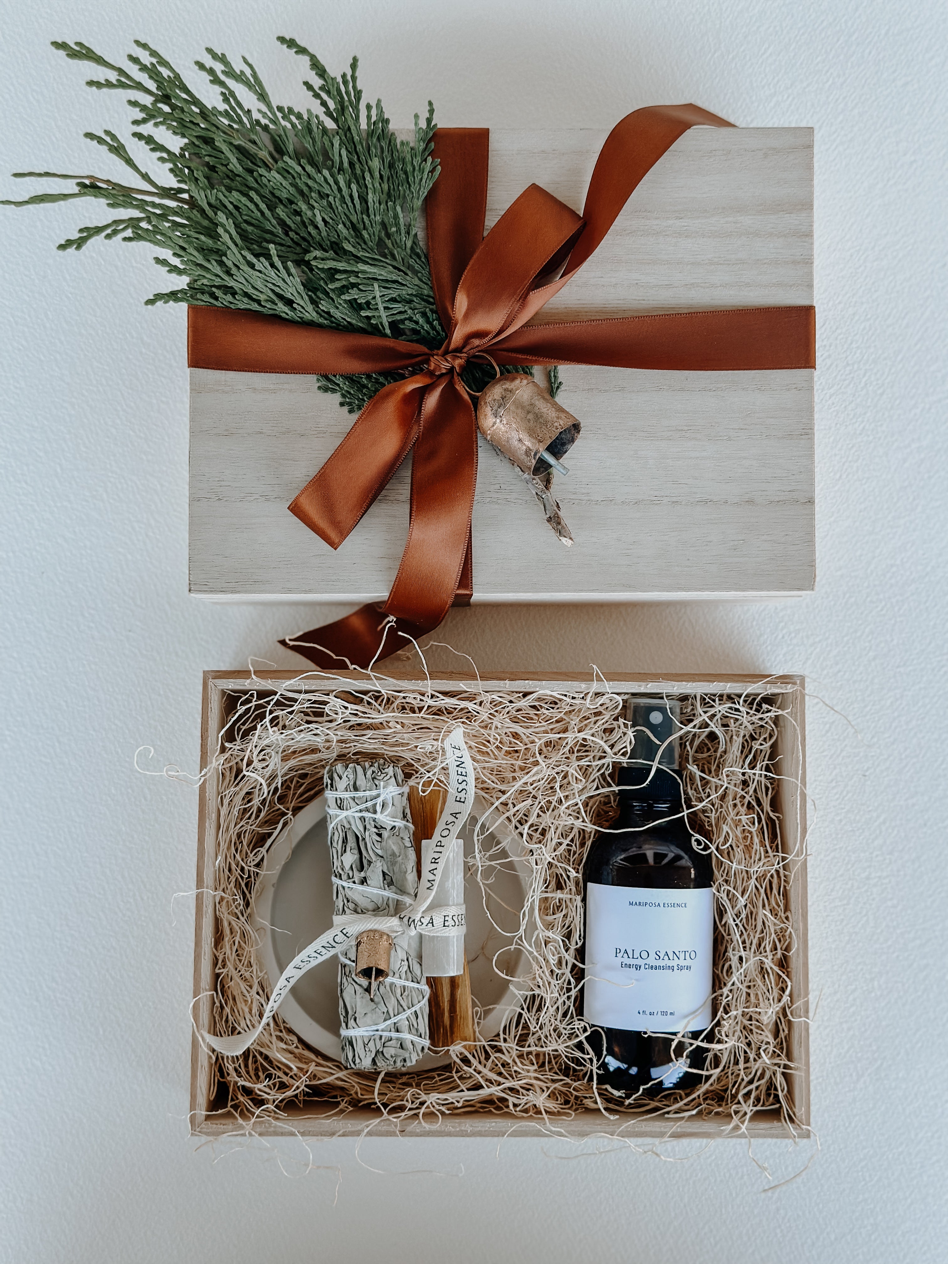 Palo Santo spray, palo santo holder and smudge kit for energy cleansing in wood box gift wrapped.