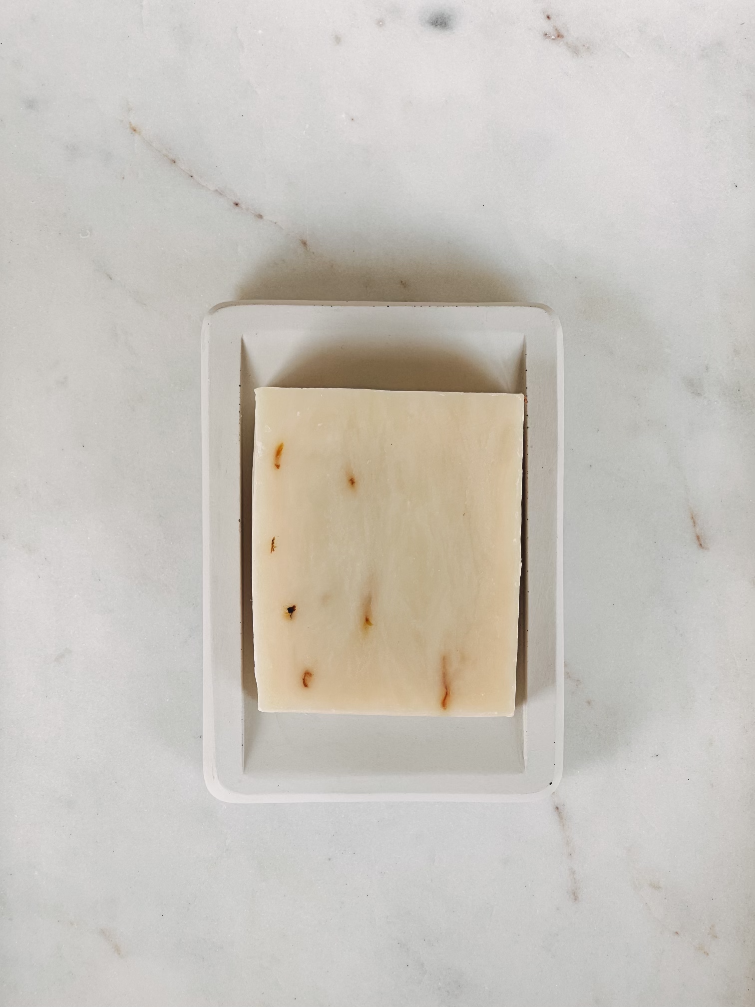 White Soap Dish displayed with soap.