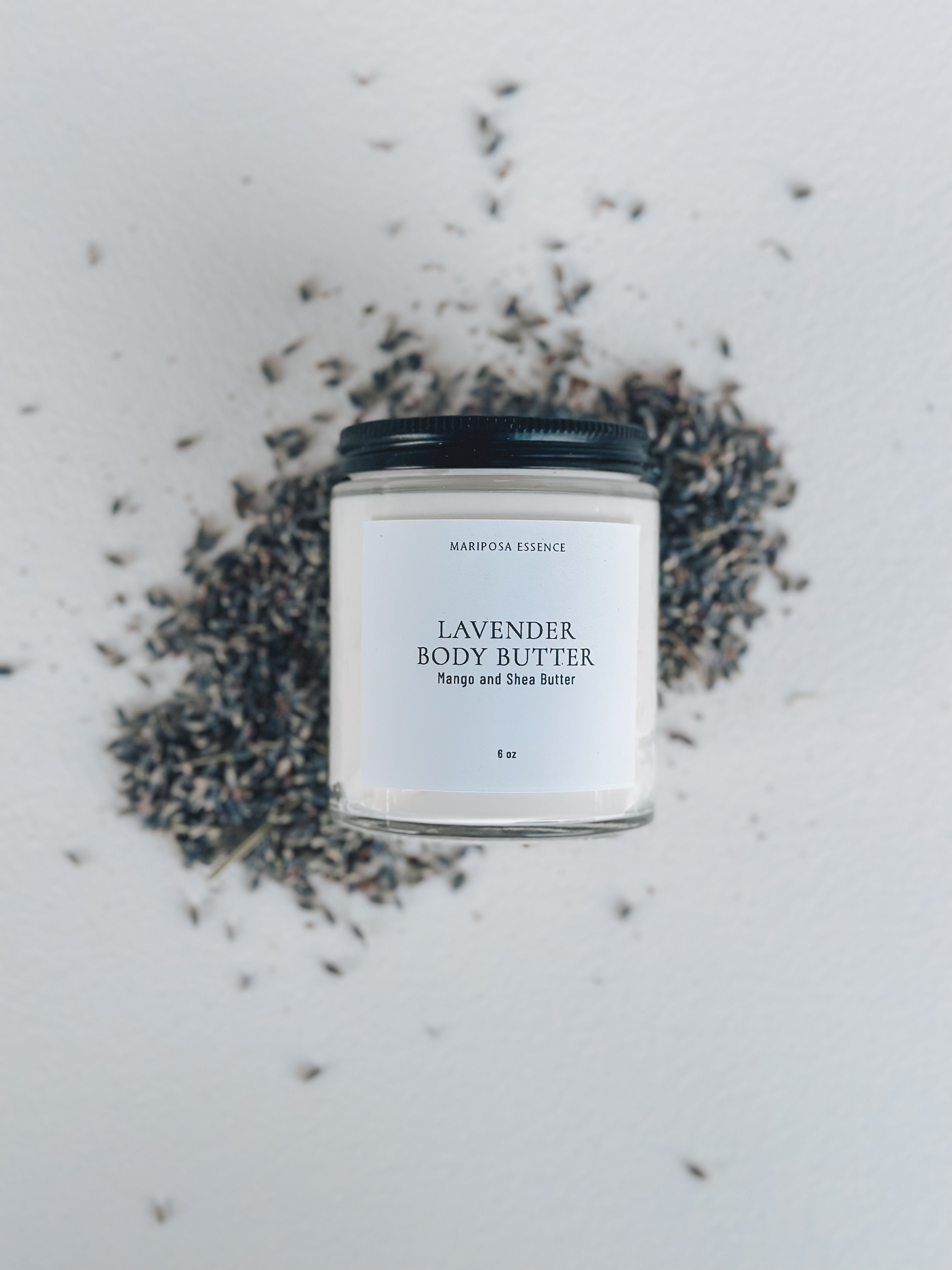 Lavender Body Butter displayed with Lavender buds